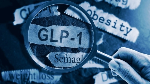 Magnifying glass over GLP-1 and Semaglutide text on torn paper strips with obesity and weight loss labels